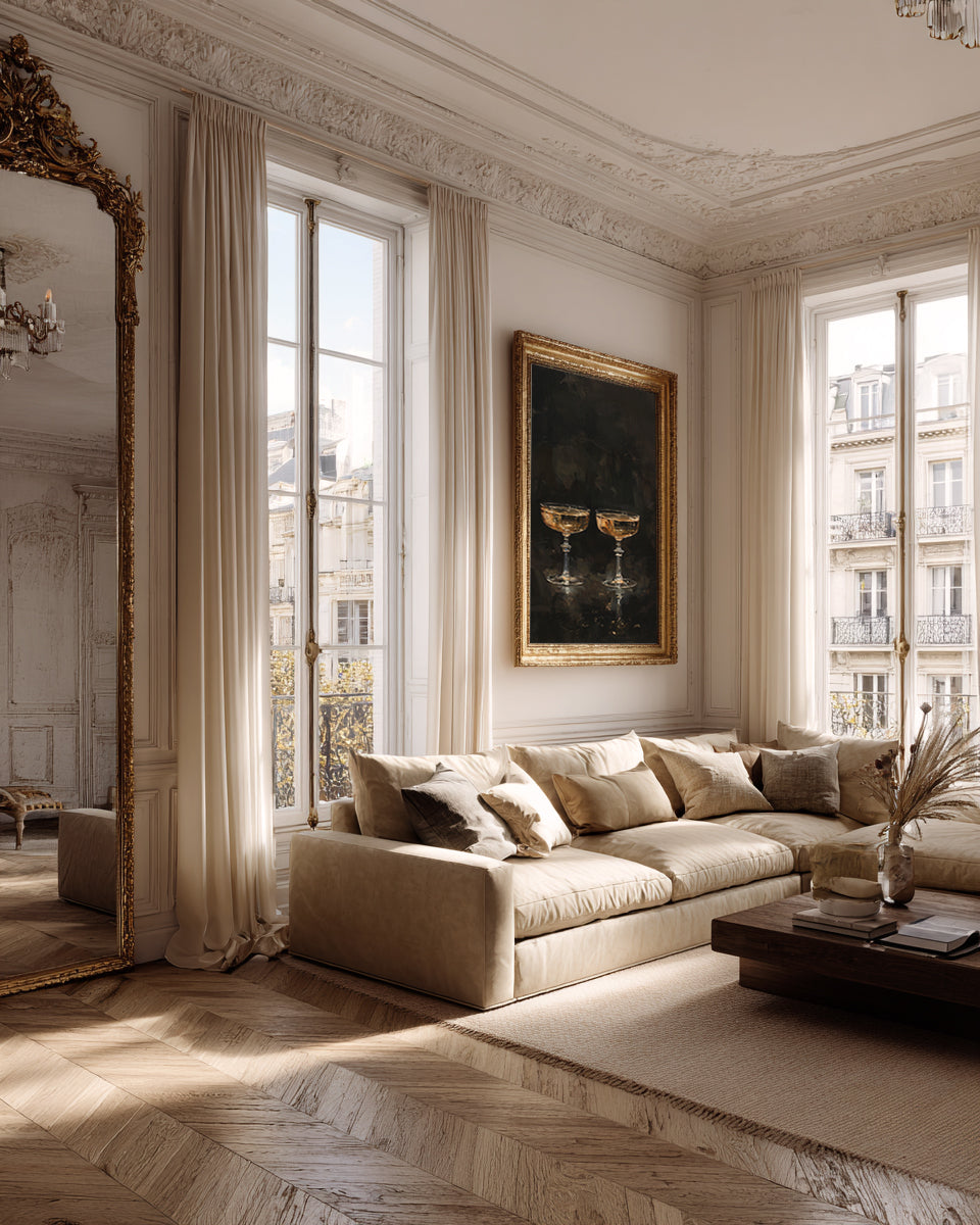 Luxurious living room with beige sofa, large mirror, and framed artwork.