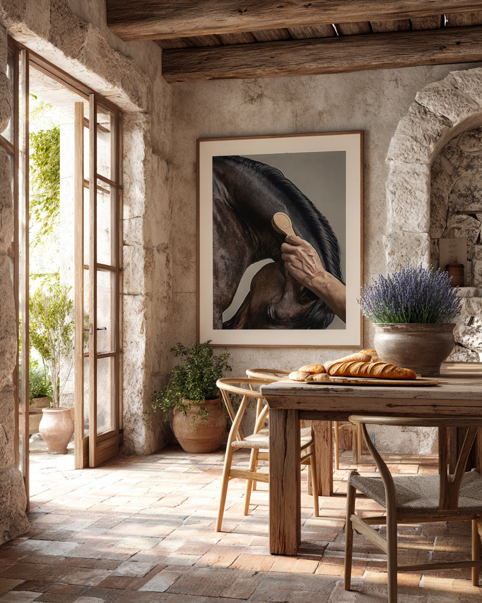 close up photograph of a horse’s crest being brushed by hand in soft studio lighting