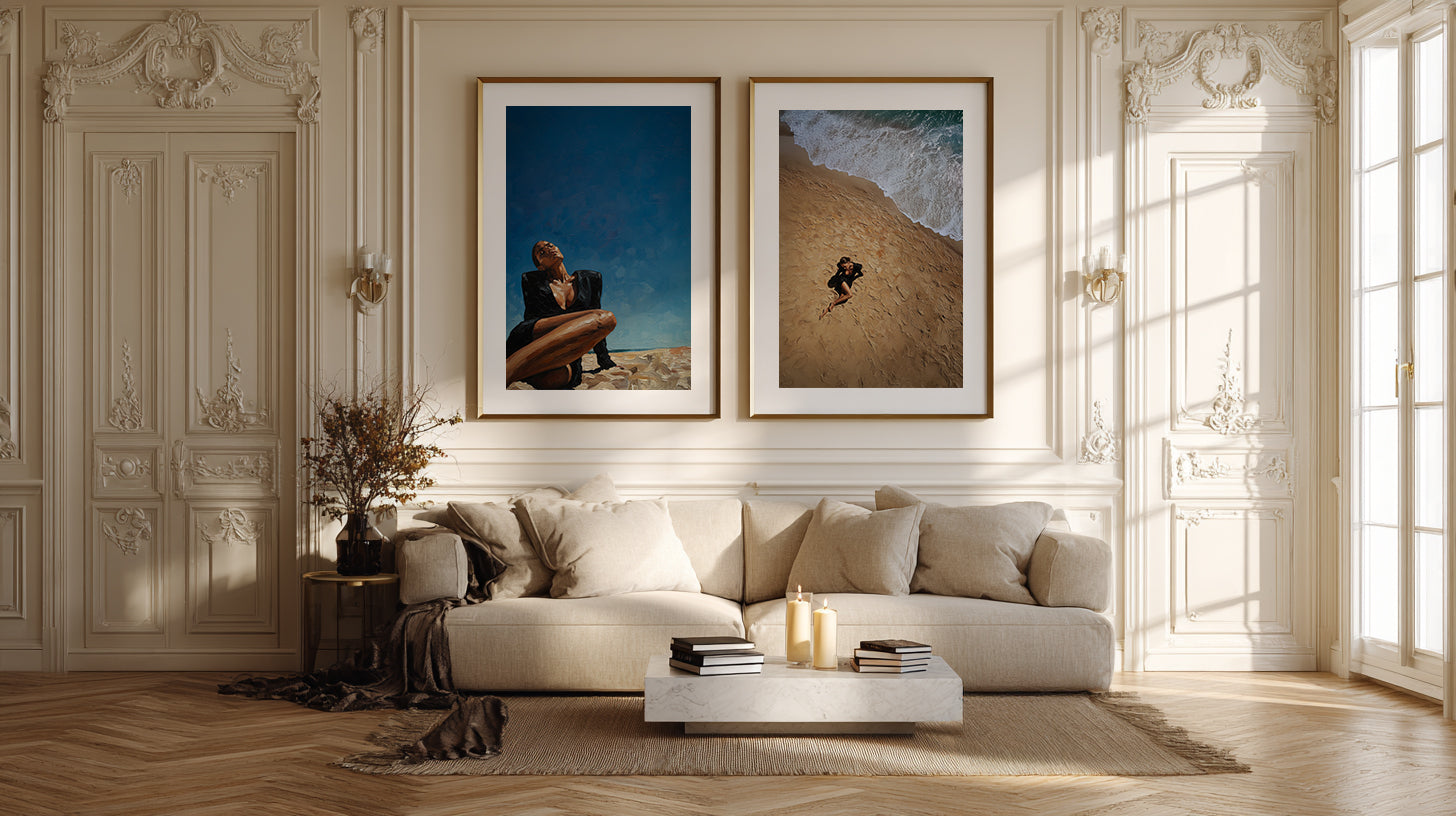 Living room with a beige sofa, coffee table, and wall art of a person on a beach.