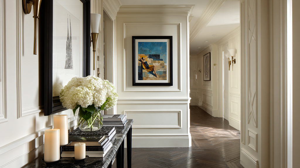 Elegant hallway with decorative elements including a mirror, candles, and artwork.