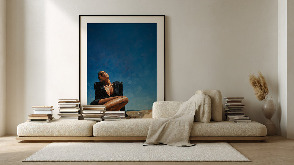 Modern living room with a large framed photograph on the wall above a sofa.