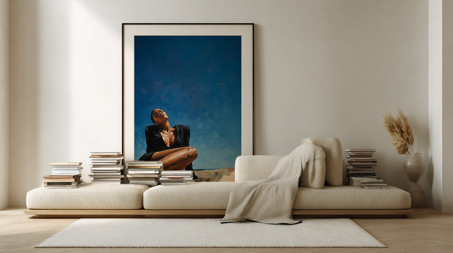 Modern living room with a large framed photograph on the wall above a sofa.