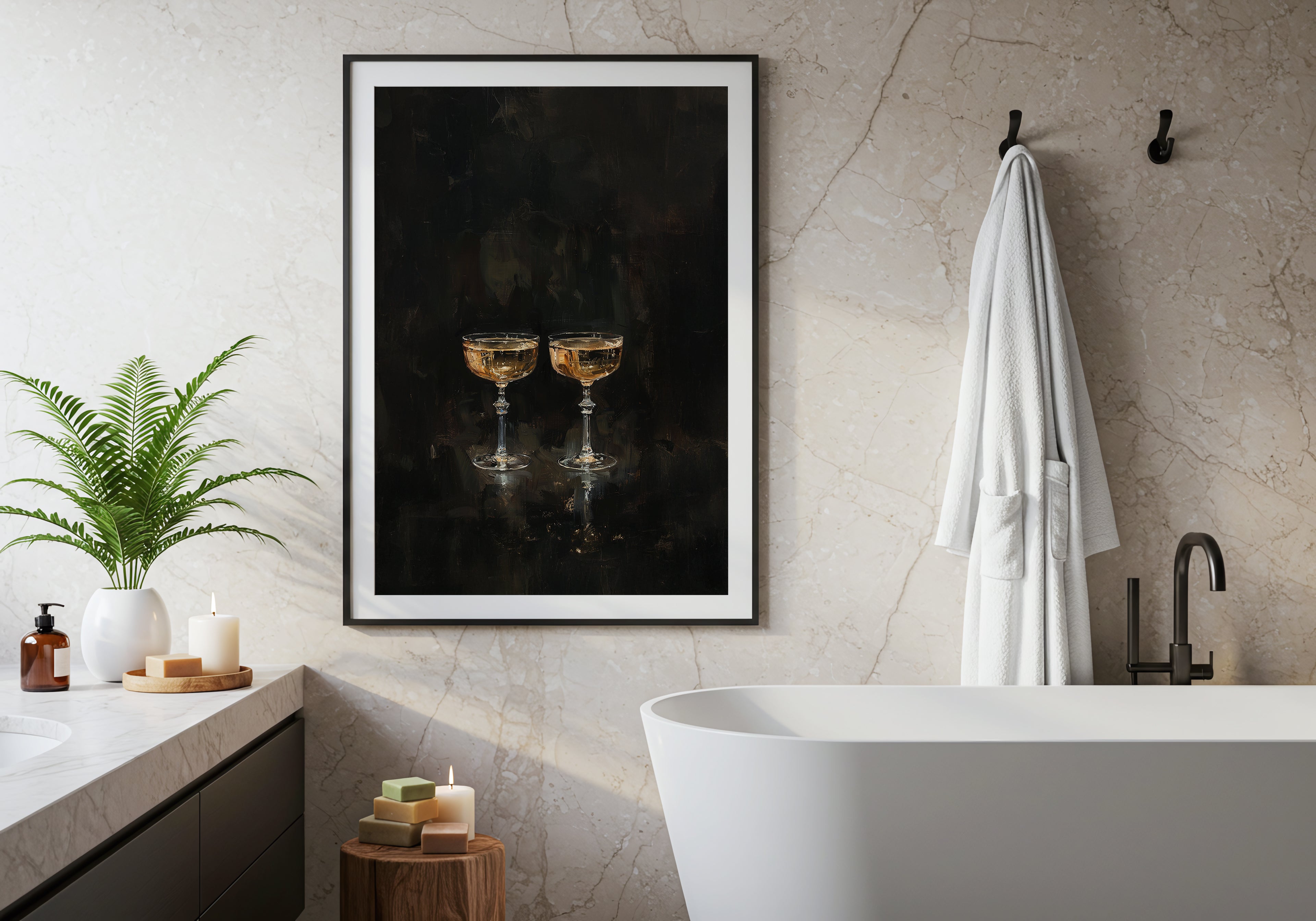 Bathroom interior with a framed artwork of two champagne glasses on the wall.