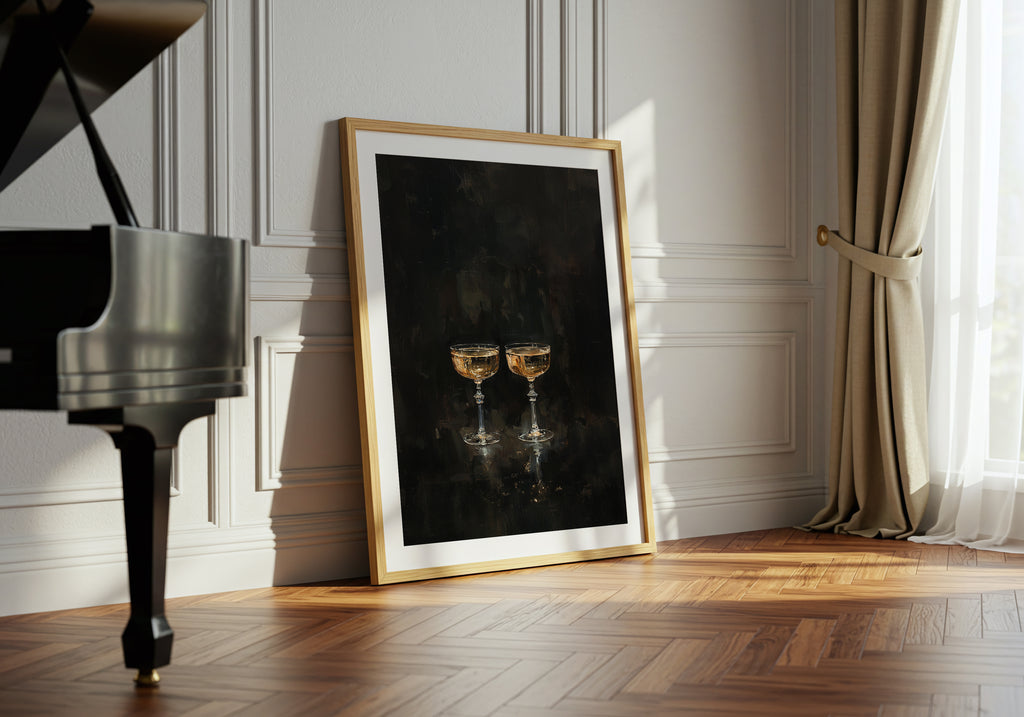 Framed artwork of two champagne glasses on a wall next to a grand piano.